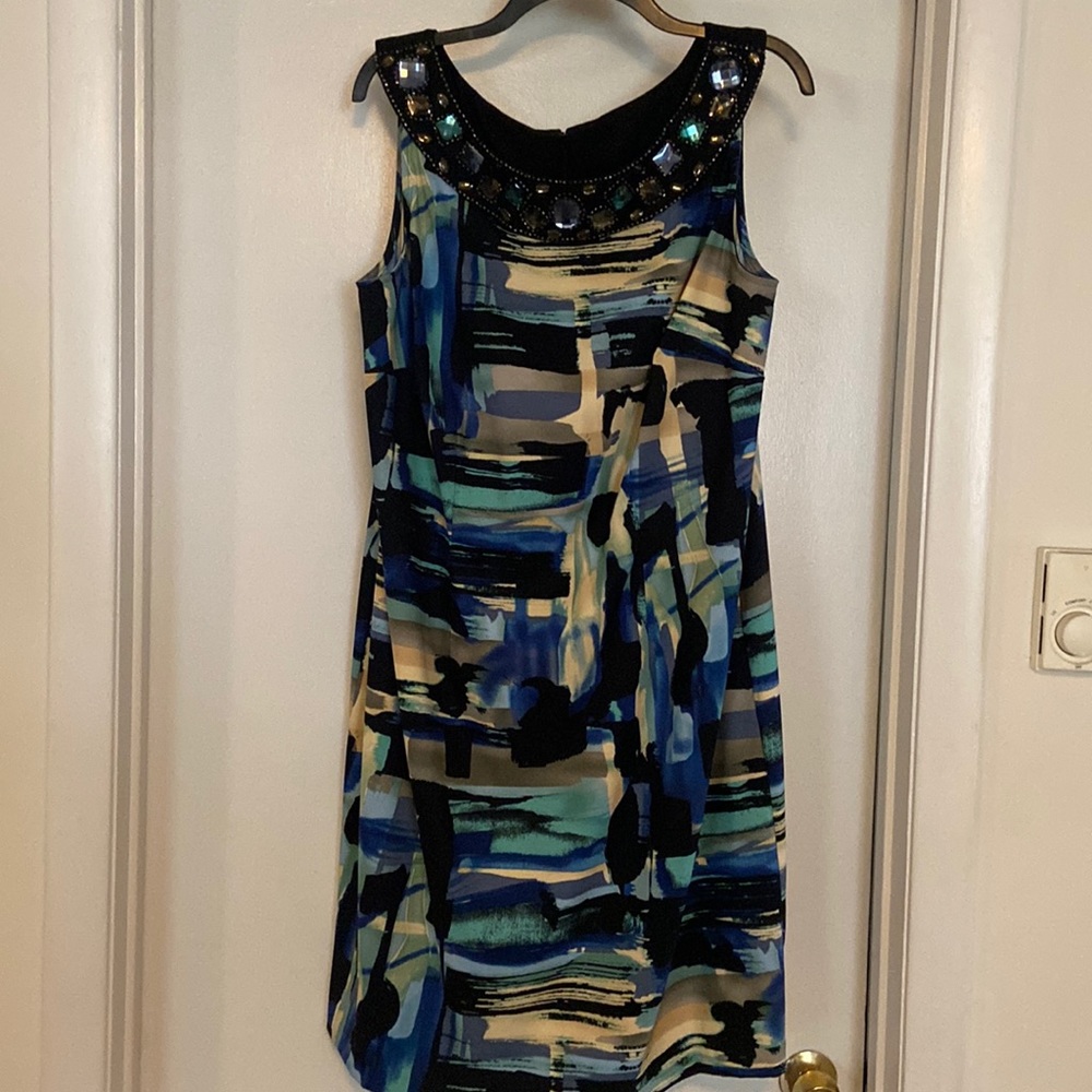 Beautiful Dressbarn multi color sheath dress with gemstone neckline